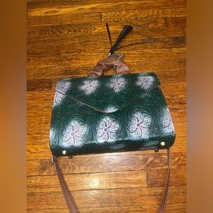Mexican inspired floral crossbody leather bag.